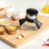 Prensaajos de mesa Ototo Design Rockula plastico acero inoxidable negro blanco