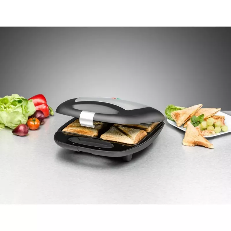 Sandwichera Rommelsbacher ST 1410 — 4 sándwiches, 1400 W, placas antiadherentes, negro/plata