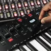 Controlador de teclado MIDI M-Audio Oxygen Pro 49 — 49 teclas, 16 pads, 9 faders, pantalla OLED, USB, MIDI-Out