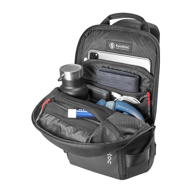Bandolera Tomtoc Navigator-T24 S — negra, compacta para el día a día