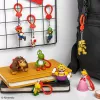 Backpack Buddies set de llaveros Paladone Super Mario CDU de 24 piezas – personajes surtidos, accesorio de coleccionista