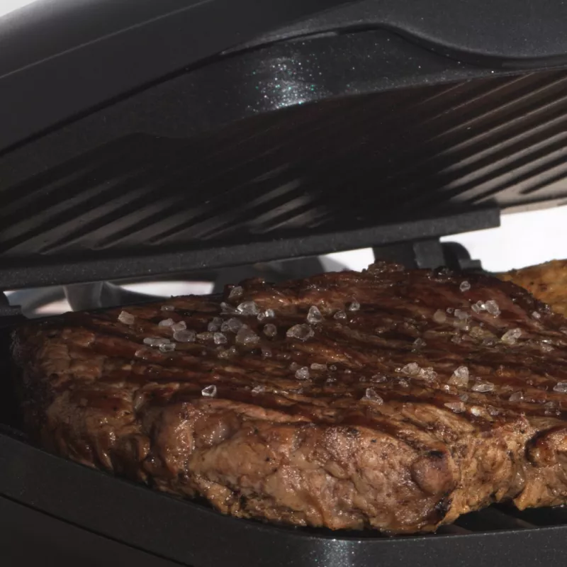 Parrilla eléctrica Petra PT4366MBLKVDE negra con recubrimiento antiadherente y temperatura ajustable