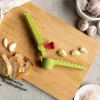 Prensaajos con mango Ototo Design Garligator verde plastico acero
