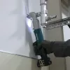 Makita TL064DZ 12V CXT llave de impacto angular a batería, unidad básica