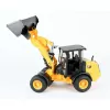Bruder 02485 CAT cargadora de ruedas articulada compacta, vehículo de juguete a escala, de plástico