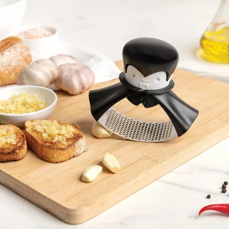 Prensaajos de mesa Ototo Design Rockula plastico acero inoxidable negro blanco