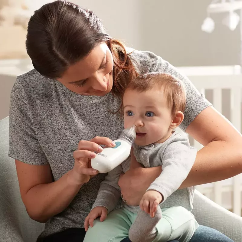 Aspirador nasal eléctrico BRAUN BNA 100 — a pilas, succión ajustable, puntas extraíbles, blanco