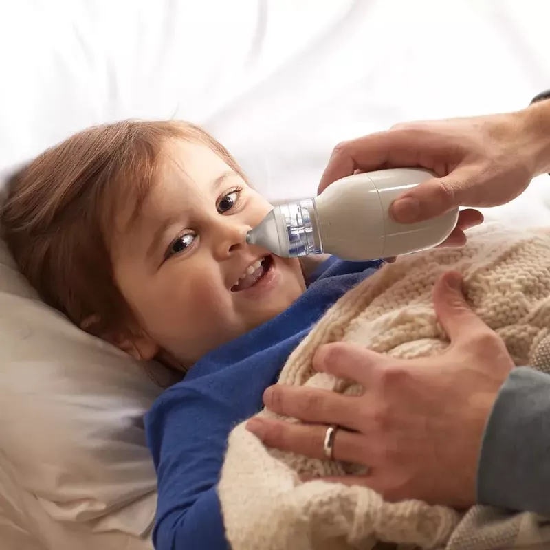 Aspirador nasal eléctrico BRAUN BNA 100 — a pilas, succión ajustable, puntas extraíbles, blanco