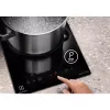 Placa de inducción Electrolux LIT30230C — 2 zonas de empotrar, 29 cm de ancho, negra, control táctil, zonas de 210/145 mm