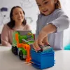 PAW Patrol: Crush N’ Roll Camión de reciclaje con figura de acción Rocky y vehículo compactador transformable, juguete para niños y niñas a partir de 3 años