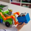 PAW Patrol: Crush N’ Roll Camión de reciclaje con figura de acción Rocky y vehículo compactador transformable, juguete para niños y niñas a partir de 3 años