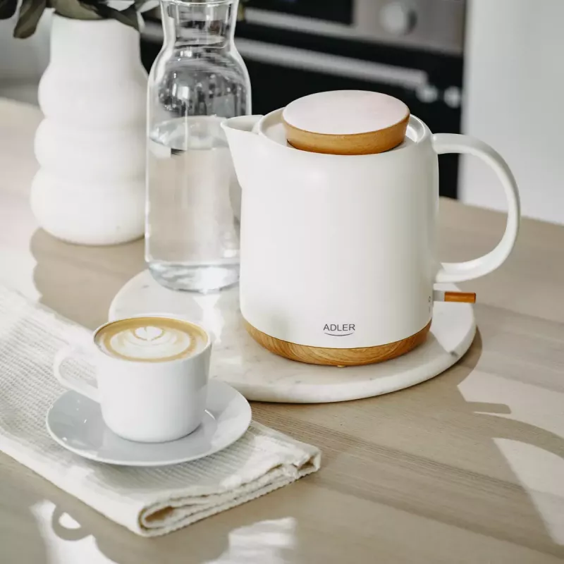 Hervidor eléctrico Adler AD 1304 — 1 L, 1200 W, carcasa de cerámica, tapa abatible, base giratoria 360°, blanco