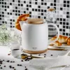 Hervidor eléctrico Adler AD 1304 — 1 L, 1200 W, carcasa de cerámica, tapa abatible, base giratoria 360°, blanco