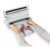 Envasadora al vacío FoodSaver VS0100X — dial giratorio, incluye rollo de film y 4 bolsas de vacío, blanco plateado