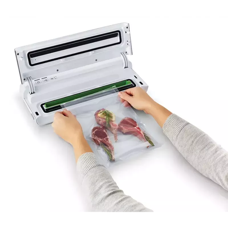 Envasadora al vacío FoodSaver VS0100X — dial giratorio, incluye rollo de film y 4 bolsas de vacío, blanco plateado