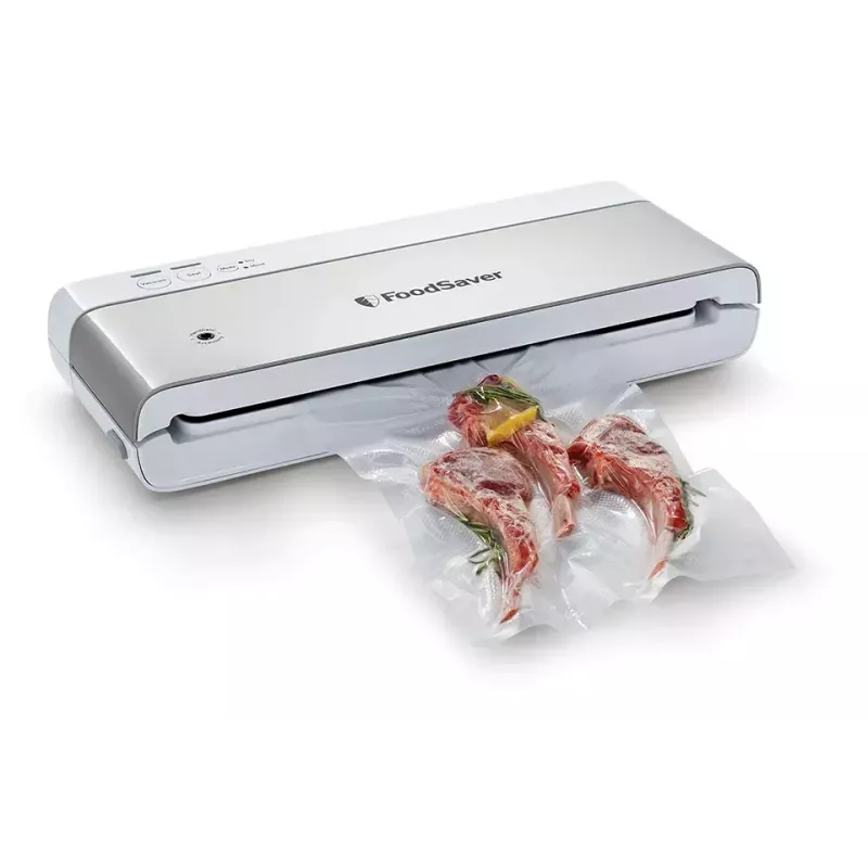 Envasadora al vacío FoodSaver VS0100X — dial giratorio, incluye rollo de film y 4 bolsas de vacío, blanco plateado