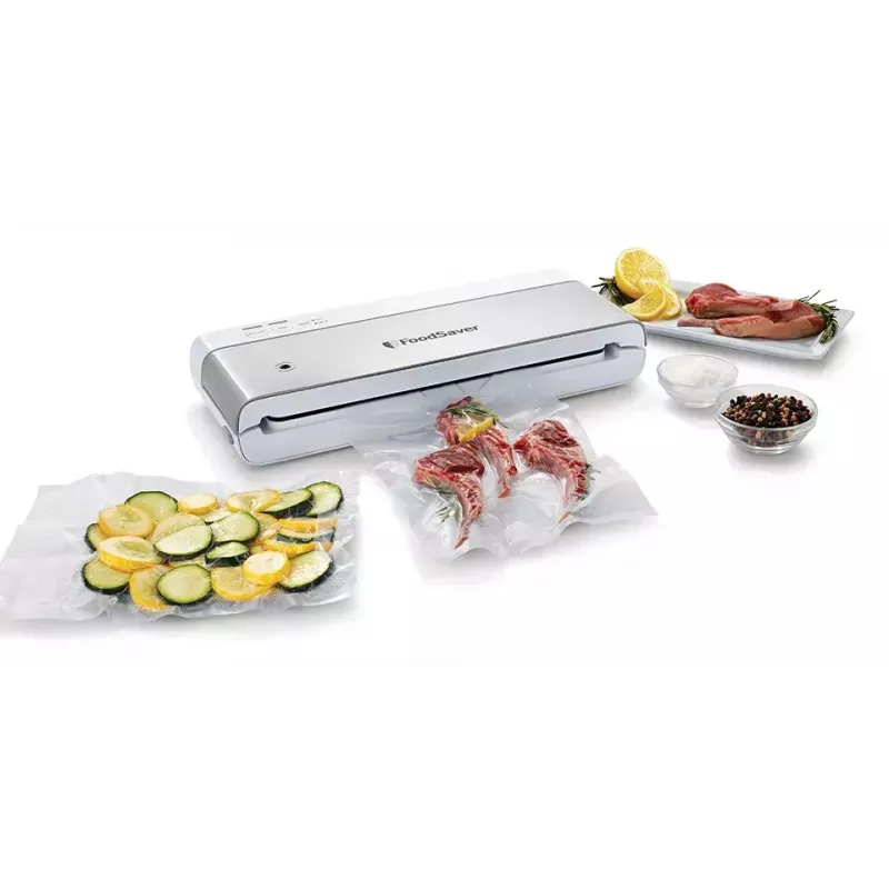 Envasadora al vacío FoodSaver VS0100X — dial giratorio, incluye rollo de film y 4 bolsas de vacío, blanco plateado