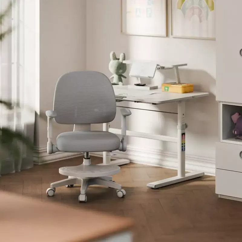 Silla giratoria mark adler Junior 5.0 — respaldo ergonómico de malla, asiento de espuma, altura ajustable 42–54 cm, gris