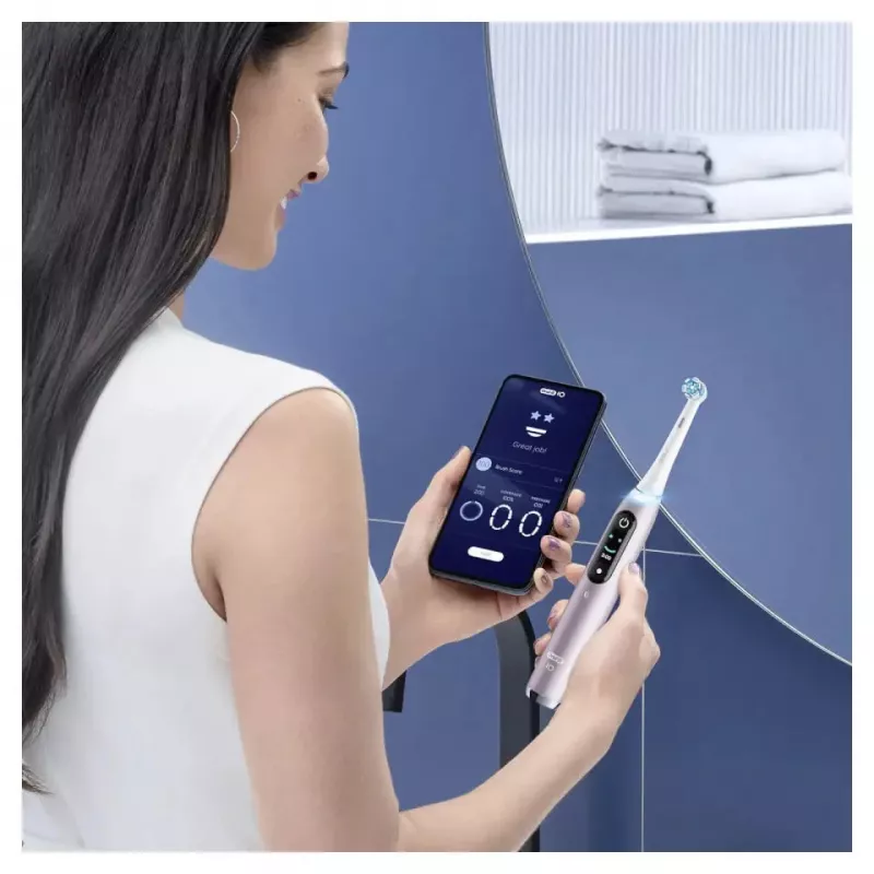 Cepillo de dientes eléctrico Oral-B iO 9 adultos rotatorio, 2 mangos, 2 cabezales, batería integrada, 3 h de carga, negro/rosa