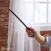 Spin Master Wizarding World Harry Potter varita auténtica de Ron Weasley con soporte de Hogwarts, para juegos de rol, de plástico, a partir de 14 años