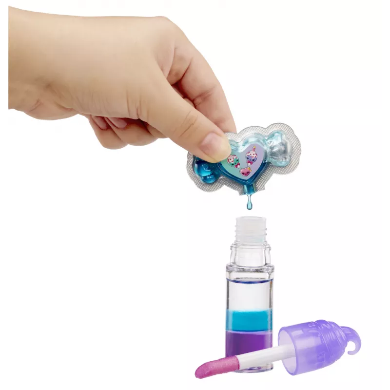 MGA Entertainment Yummiland muñeca misteriosa con brillo de labios - Carly Cakepop