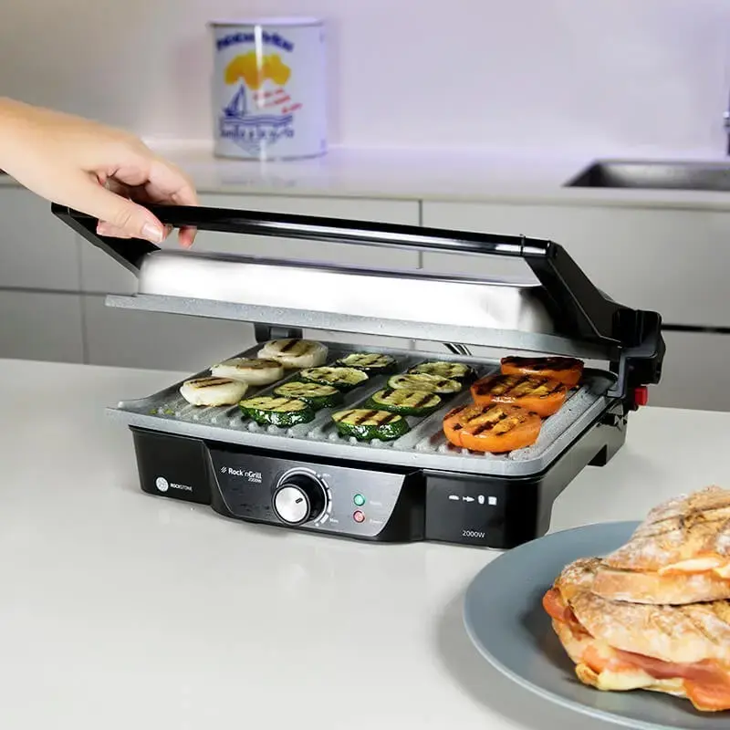 Parrilla de contacto CECOTEC Rock'nGrill 2000 — 2000 W, rectangular, negra/acero inoxidable, termostato ajustable, 340×330×130 mm