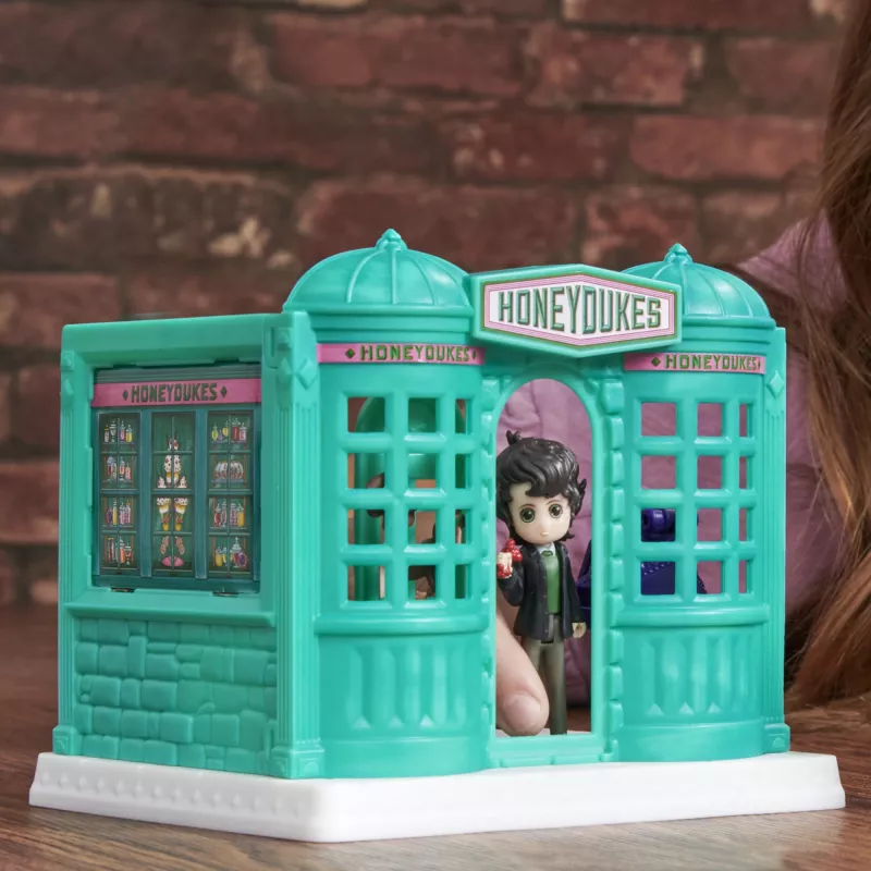 Wizarding World Harry Potter, tienda de dulces Honeydukes Magical Minis con 2 figuras exclusivas y 5 accesorios, juguete infantil a partir de 6 años
