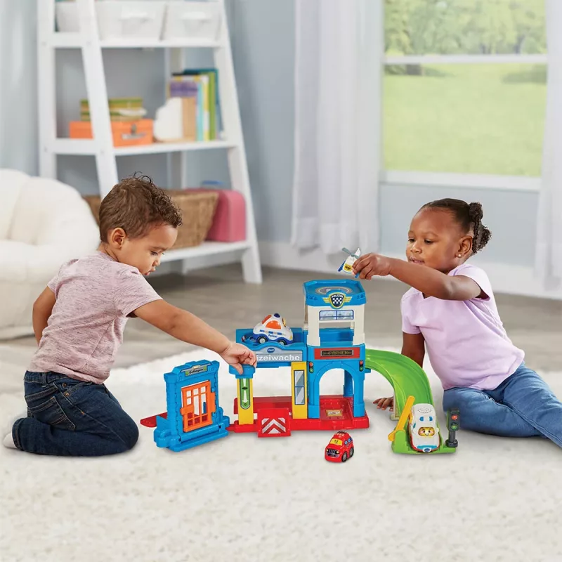 Set de juego VTech Tut Tut Baby Flitzer comisaría de policía 80-569904 con funciones interactivas y vehículos