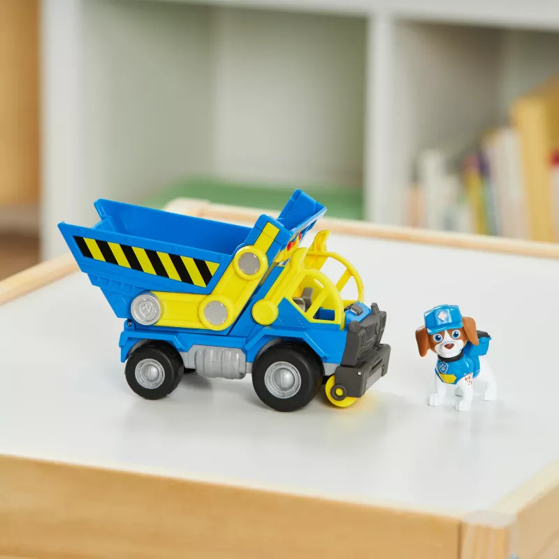 Rubble & Crew, camión volquete de juguete Wheelers con piezas móviles y una figura coleccionable, juguete infantil a partir de 3 años