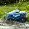 Monster Jam, camión monstruo teledirigido oficial Megalodon STORM All-Terrain, escala 1:15