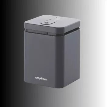 Difusor de aroma por evaporación Stylies ELARAGris para hasta 25 m² — Red / Batería / USB, temporizador de 2 horas, 1,3 W, 74×74×100 mm, gris