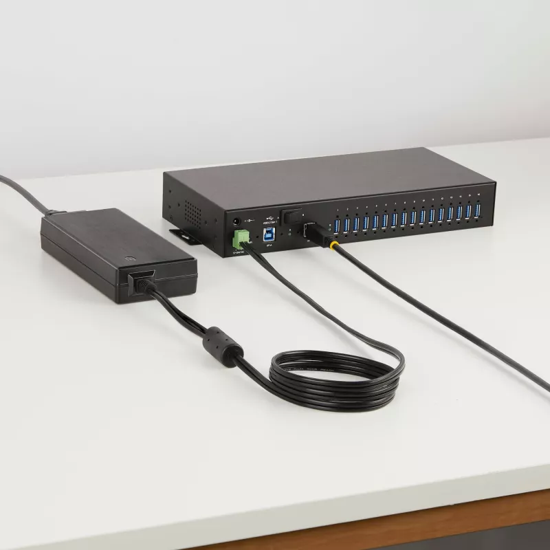 StarTech.com Hub USB industrial de 16 puertos 5Gbps con fuente de alimentación, carcasa metálica, montable, protección ESD, alimentación por regletas, función de carga USB, conmutador dual-host – TAA