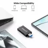 Lector/grabador de tarjetas múltiple combinado Manhattan USB-A / USB-C, 5 Gbit/s (USB 3.2 Gen1 alias USB 3.0), conector macho a ranuras microSD y SD/MMC, formato mini, SuperSpeed USB, Windows o Mac, negro/transparente, tres años de garantía