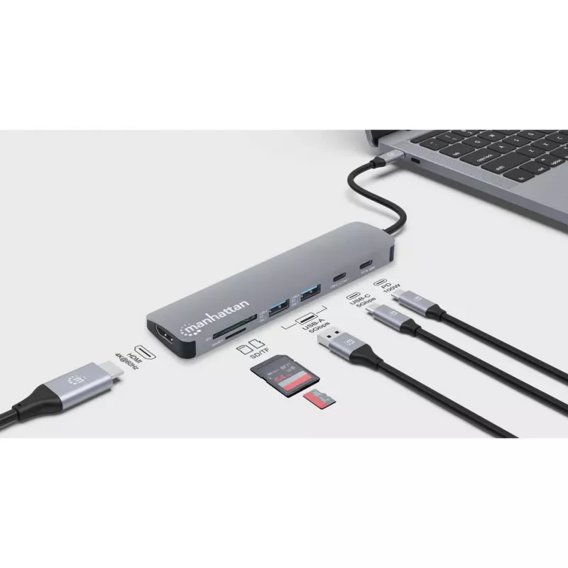 Manhattan dock/hub USB-C con lector de tarjetas, conexiones (x5): HDMI, USB-A (x2) y USB-C (x2), con Power Delivery (PD) 100W – requiere cargador USB-C externo (no incluido). Alimentado por USB (no requiere fuente de alimentación externa) cuando no se utiliza PD