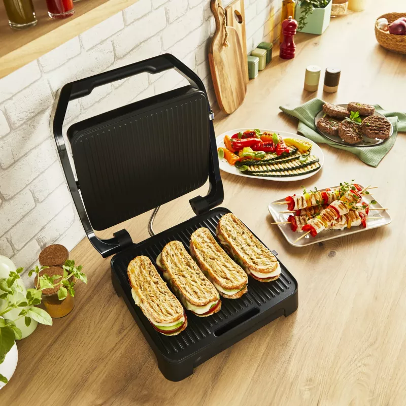 Parrilla de contacto Tefal Inicio Adjust GC272D10 con placas antiadherentes y temperatura ajustable