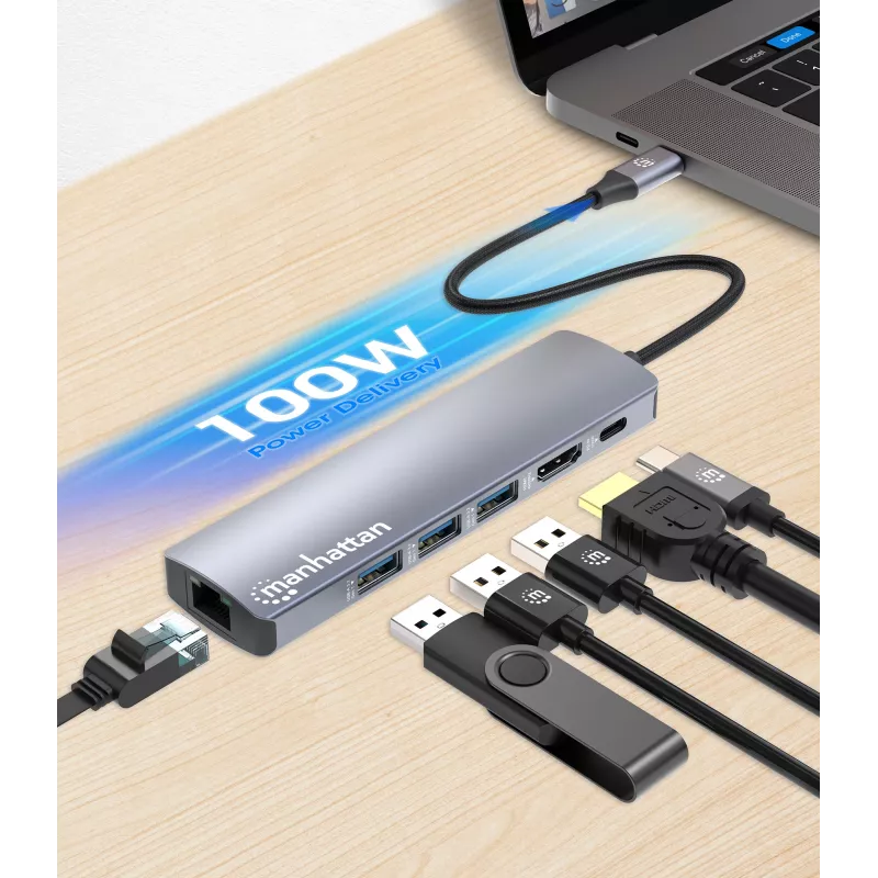 Dock/Hub USB-C Manhattan, conexiones (x6): Ethernet, HDMI, USB-A (x3) y USB-C, con Power Delivery (PD) 100W – requiere cargador USB-C externo (no incluido). Alimentado por USB (no requiere fuente de alimentación externa) cuando no se utiliza PD