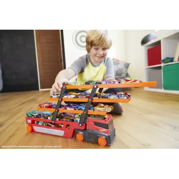 Hot Wheels City Mega Hauler con espacio para hasta 50 coches a escala 1:64, a partir de 3 años
