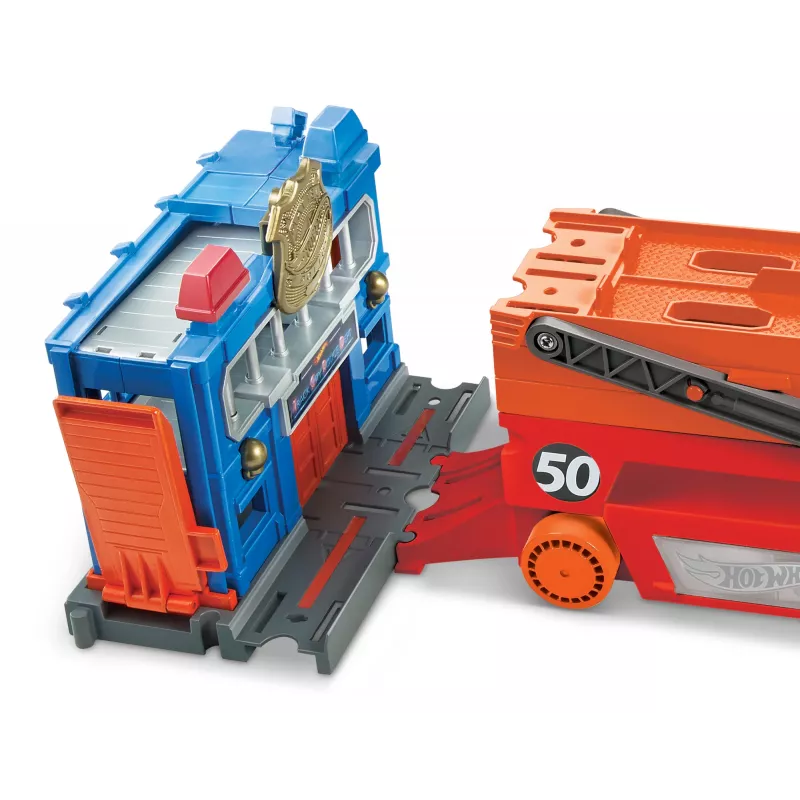 Hot Wheels City Mega Hauler con espacio para hasta 50 coches a escala 1:64, a partir de 3 años