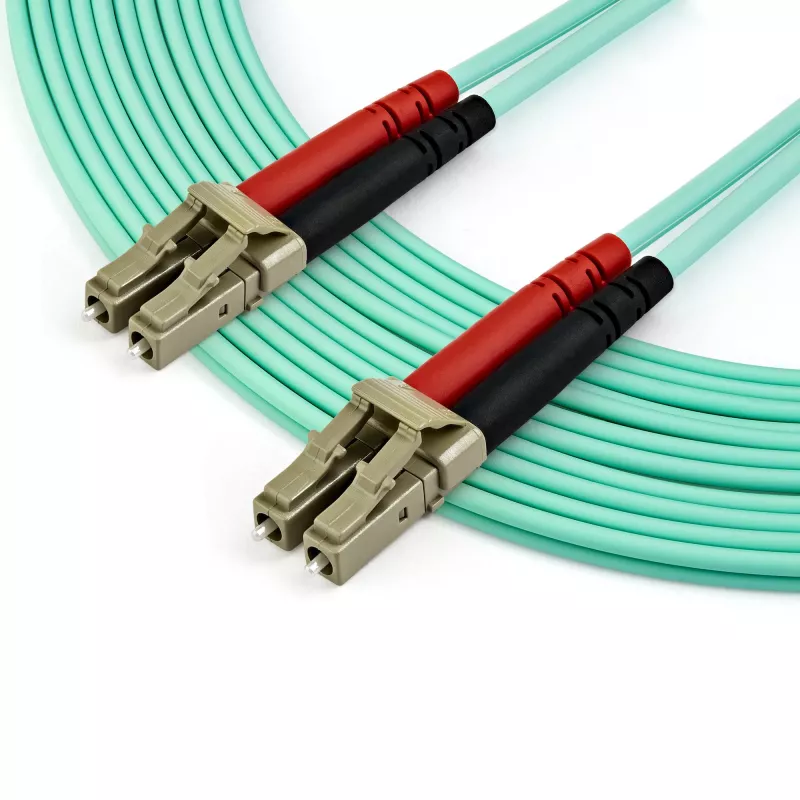 StarTech.com Cable de fibra óptica multimodo LC/UPC a LC/UPC OM4 de 7 m (22 ft), fibra zipcord LOMMF/VCSEL 50/125 µm, 100G, baja pérdida de inserción – Cable jumper de fibra óptica LSZH