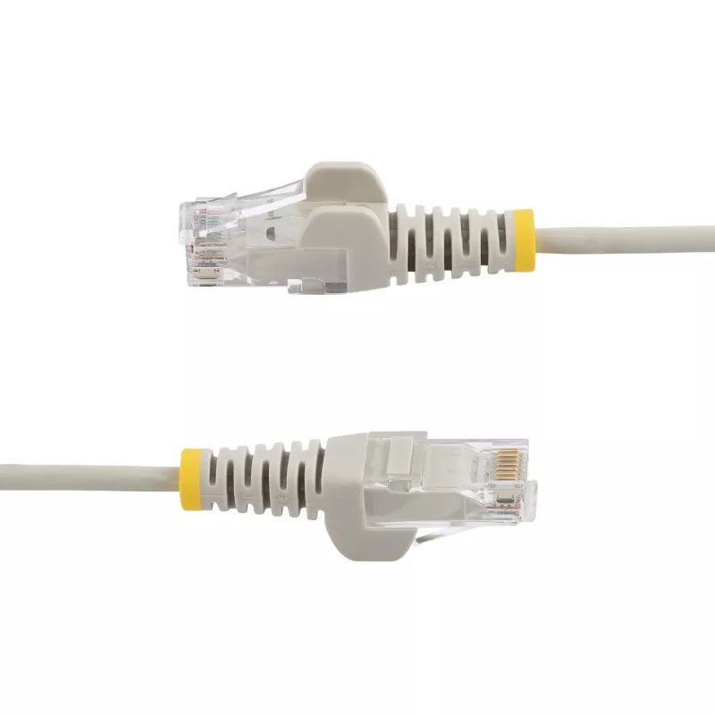 StarTech.com Cable Ethernet CAT6 fino de 25 cm gris, protección de lengüeta, 100W PoE, UTP, LSZH, 28AWG cable de cobre desnudo puro, cable de red patch RJ45 fino con alivio de tensión, probado individualmente