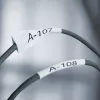 DYMO Rhino Tubos de etiquetas termorretráctiles para cables industriales | 24 mm x 1,5 m | Impresión negra sobre amarillo | para impresoras de etiquetas Rhino
