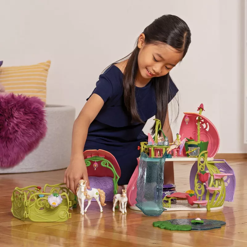 schleich BAYALA Casa de flores brillante con unicornios, lago y establo