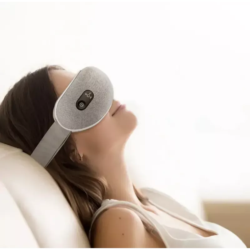 Masajeador de ojos Havit EM1601 gris masaje por compresión a pilas