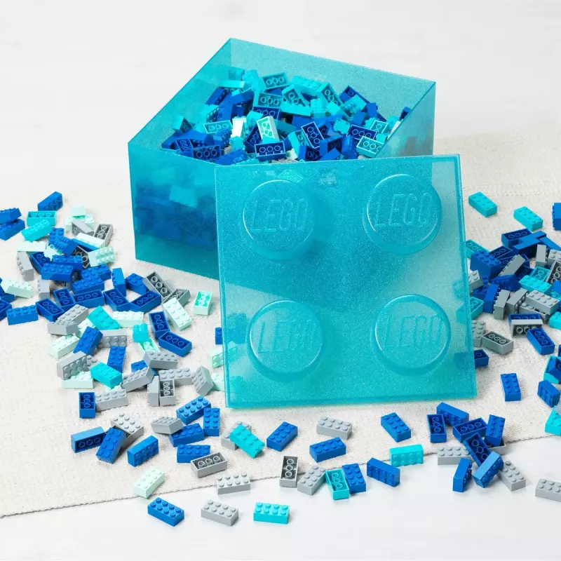 Storage Brick 4 Top Lid Glitter by room copenhagen — caja de almacenamiento tipo LEGO azul claro/transparente