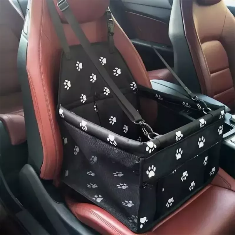 Transportín pequeño para perros y gatos iLike para viajes en coche, impermeable y plegable, patrón de huellas negras