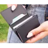 Evelatus Monedero universal de piel LEW01 negro
