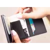 Evelatus Monedero universal de piel LEW01 negro