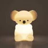 Kaloo Koala Petit Songe Luz nocturna infantil de silicona USB