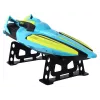 LEAN TOYS Lancha RC 2.4G amarillo-turquesa resistente al agua con mando a distancia
