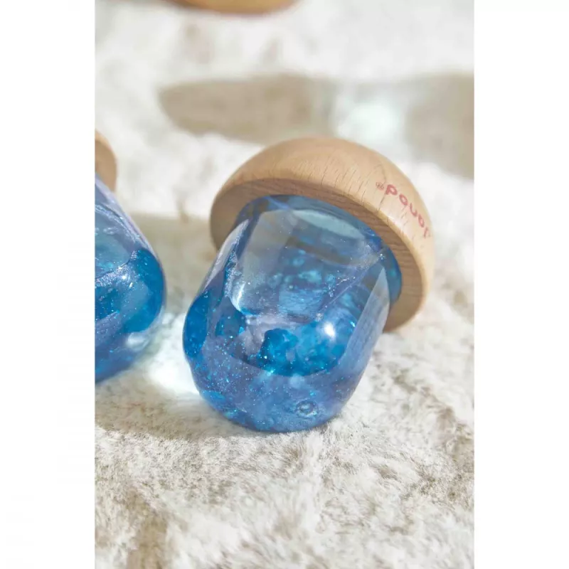 Janod bola de nieve sensorial con purpurina azul 12m+